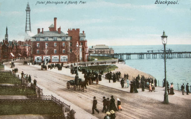 Vintage Postcard of Blackpool Seafront Vintage Postcard of the Metropole Hotel and north pier and Blackpool Seafront with horsedrawn carriages, circa 1900 north pier stock pictures, royalty-free photos & images