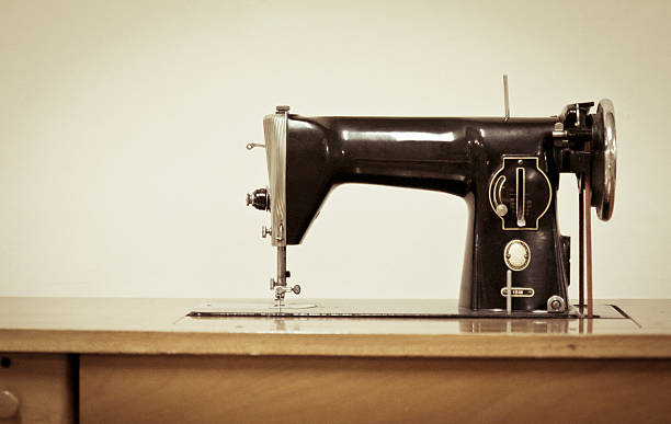 vintage sewing machine stock photo