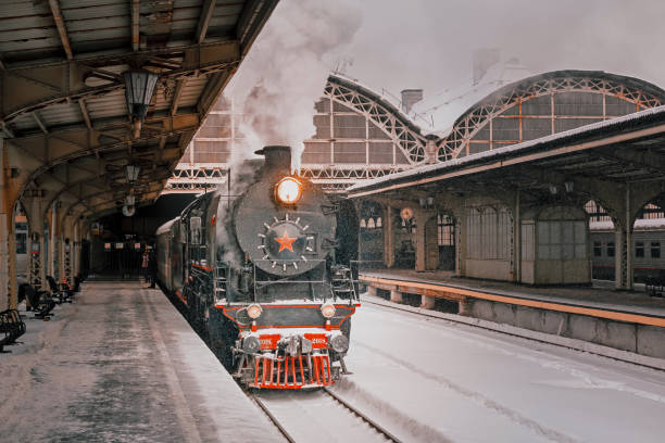 Vintage steam locomotive at the railway station. Soviet steam locomotive. Station in Art Nouveau style. railroad station photos stock pictures, royalty-free photos & images