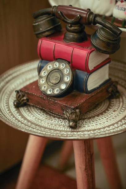Vintage telephone decoration on a table stock photo