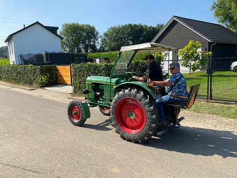 Hulsberg,  the Netherlands, -  September 05, 2021. Vintage tractor at a brocante Market  in the Limburg country near the village cold Hulsberg.
