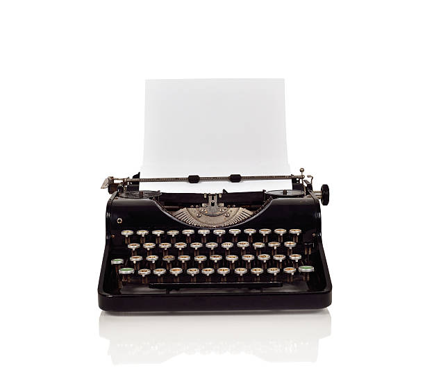 Vintage typewriter Vintage typewriter with paper on a white background typewriter stock pictures, royalty-free photos & images