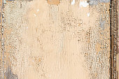istock Vintage wood texture background. Old wooden wall or door with peeling brown white paint. 1362495742