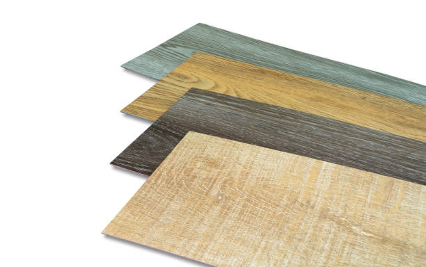Vinyl tiles stack sample collection for interior designer. New wooden pattern vinyl tile. Vinyl flooring material isolated on white background. Polymer vinyl sheet set for new home floor. PVC material stock photo