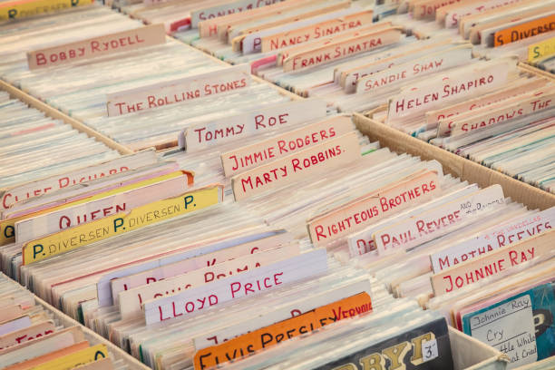 Vinyl turntable records on an antique fifties to seventies flea market stock photo