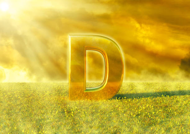 Vitamin D illuminated by the rays of the sun on grass. Sunlight is an excellent source of this nutrient that strengthens the immune system stock photo