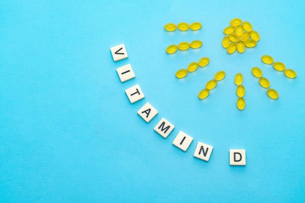Vitamin D with a sun and letters stock photo