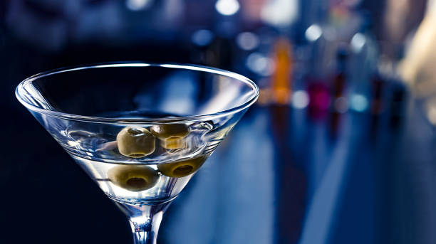 vodkatini, straight up, lemon twist, classy, gypsy queen, tequila, simple, wet, french martini, fancy, neat, double, lemon twist cocktail vodka martini close up. party in a nightclub. cocktail 007. dirty martini stock pictures, royalty-free photos & images