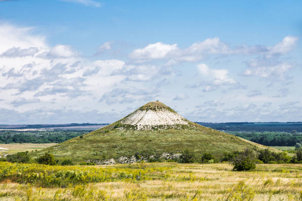 Volcano-like hill in the steppe stock photo