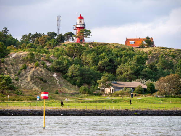 Vuurduin lighthouse on vuurboetsduin, East-Vlieland on West Frisian island Vlieland, Netherlands stock photo