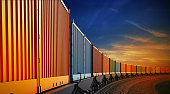 istock wagon of freight train with containers on the sky background 532305959