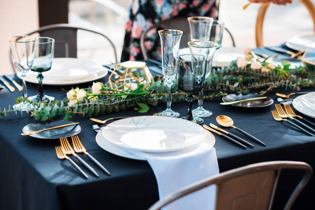 Waiting for the guest,table elegance set Black and gold color Elegant table set for Wedding celebration reception in barn or luxury dinner party wedding reception stock pictures, royalty-free photos & images
