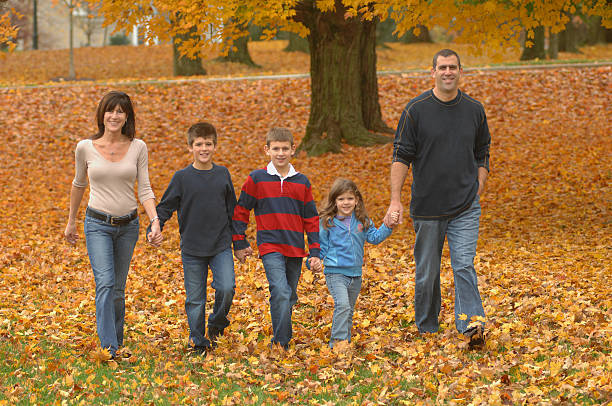 walking family stock photo