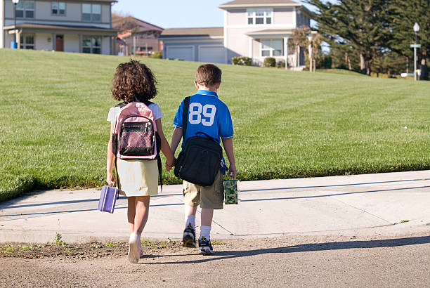 Walking to School school district stock pictures, royalty-free photos & images