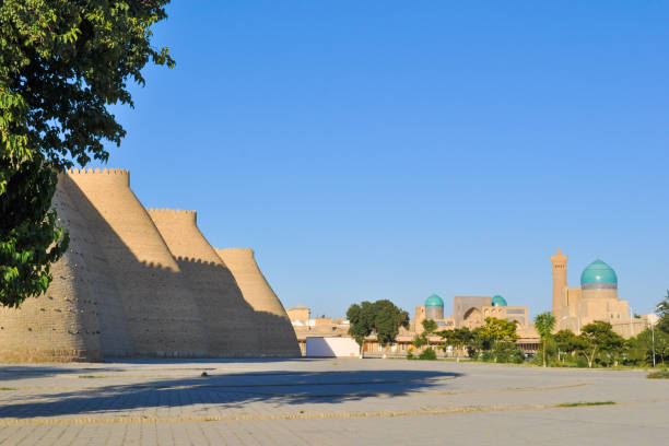 Wall and towers of the ancient citadel in Bukhara "Ark citadel", Uzbekistan. Wall and towers of the ancient citadel in Bukhara "Ark citadel", Uzbekistan. bukhara stock pictures, royalty-free photos & images