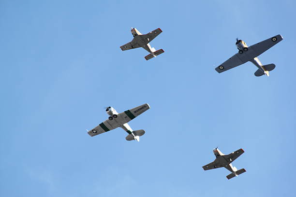 WW2 Warbird Planes Formation Flying World War 2 fighter planes in formation. Warbirds from 1945. ww2 american fighter planes pictures stock pictures, royalty-free photos & images