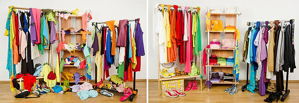 Wardrobe before messy after tidy arranged by colors. stock photo