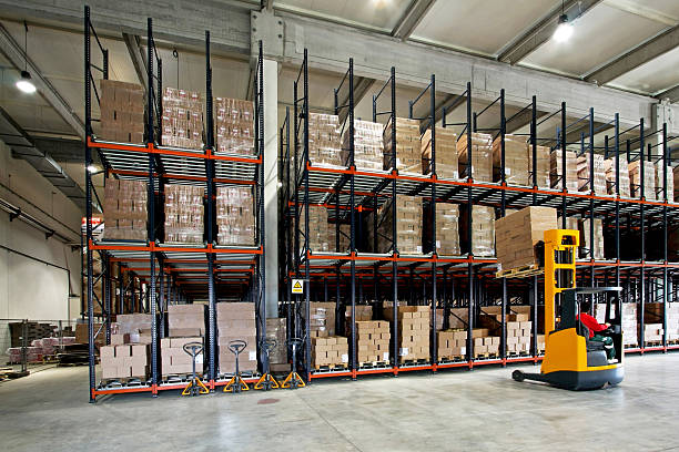 Warehouse forklifter stock photo