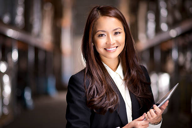 warehouse manager warehouse manager one young woman only stock pictures, royalty-free photos & images