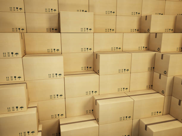 warehouse with stack of cardboard boxes stock photo
