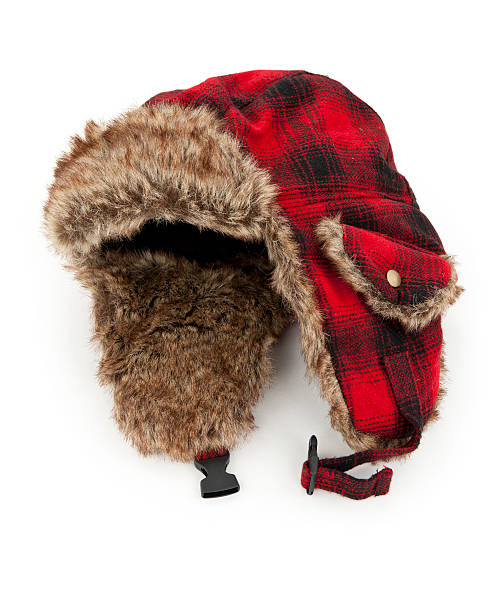 Warm Winter Hat "Warm winter fur hat, isolated on white.Please also see:" knit hat stock pictures, royalty-free photos & images