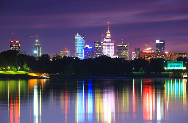 Warsaw night view of the city from the river stock photo