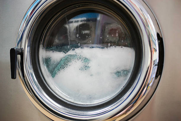 Washing Machine Laundromat Close-Up laundromat photos stock pictures, royalty-free photos & images