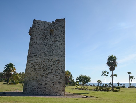 Beacon tower at the coastal path of Estepona,  Malaga, Andalusia, Spain.