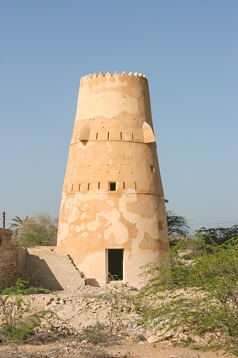 A watchtower in Al Jazirat Al Hamra, a town to the south of the city of Ras Al Khaimah in the United Arab Emirates. It is known for its collection of abandoned houses and other buildings.