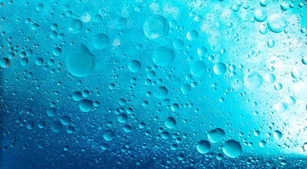 Water bubbles evenly placed in an abstract manner. Classic blue, aqua Menthe color. Water bubbles evenly placed in an abstract manner. aqua menthe photos stock pictures, royalty-free photos & images