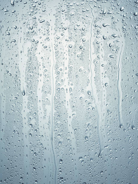 Water condensation Condensation on glass window with water drops condensation stock pictures, royalty-free photos & images