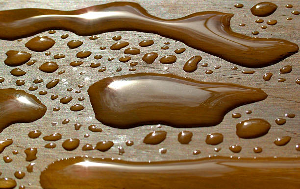 Water droplets on wood stock photo