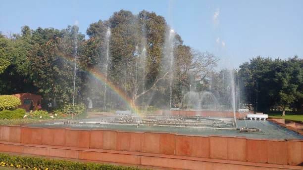 Water Fountain with Rainbow stock photo
