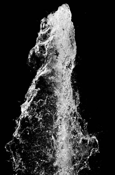 Water splash over black background stock photo