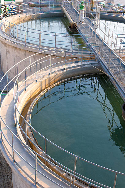 Water tanks in the wastewater treatment processing stock photo