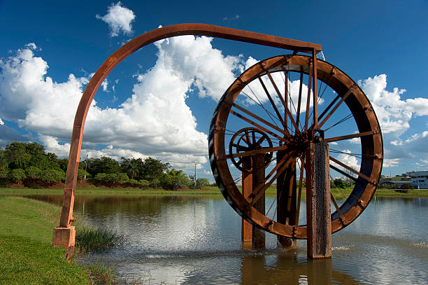 Water wheel Water wheel in a lake in the state of Minas Gerais in Brazil water wheel stock pictures, royalty-free photos & images