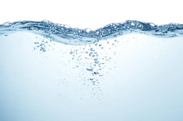 water with splash and bubbles blue water surface with splash and air bubbles on white background drinking water photos stock pictures, royalty-free photos & images