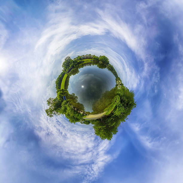 Water World A small lush planet. Ecosystem is complete with fresh water, lush trees, and clean skies. A small houses border the lake. fish eye lens stock pictures, royalty-free photos & images