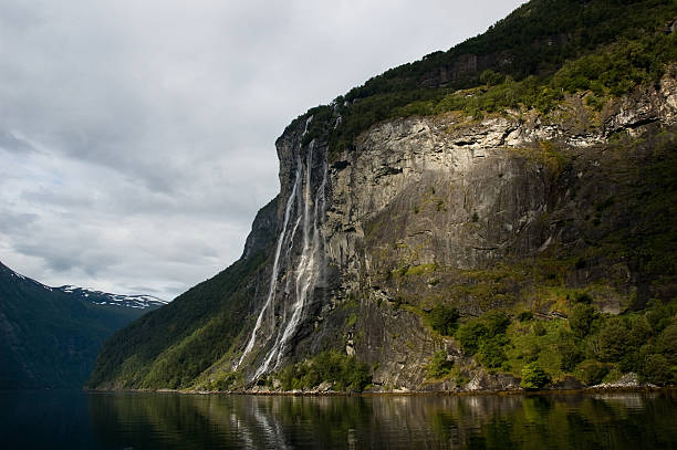 waterfall in the fjord stock photo