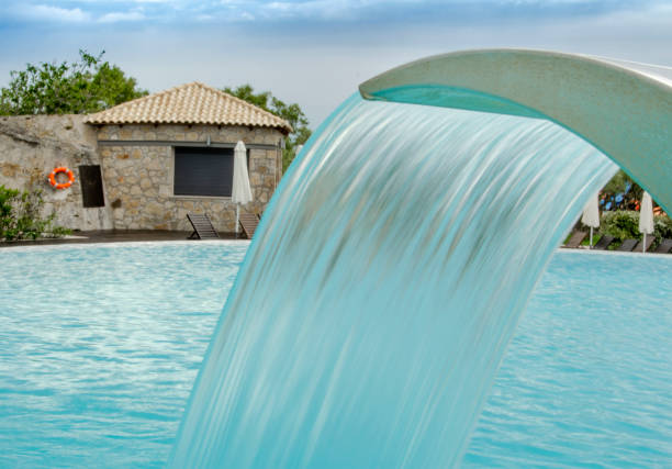 waterfall jet with hot tub in action stock photo