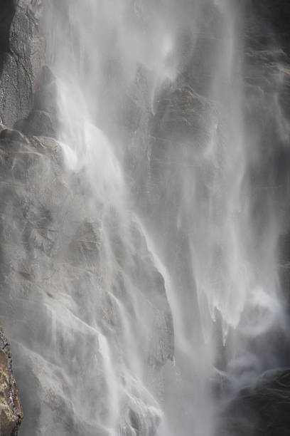 Waterfall Mist of Bridalveil Fall in Yosemite National Park stock photo