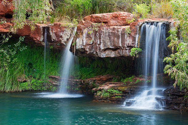 Waterfalls at fern Pool in Karijini National Park, Western Australia stock photo