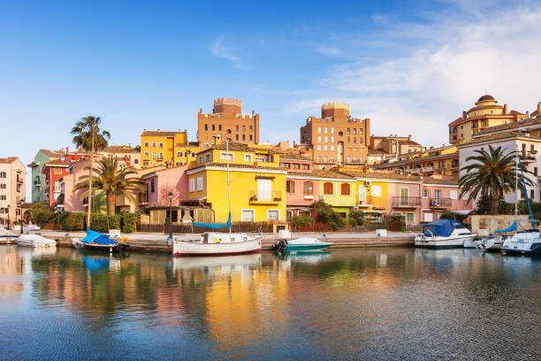 Stock photograph of the colorful waterfront in Port Saplaya, Valencia, Spain on a sunny day.