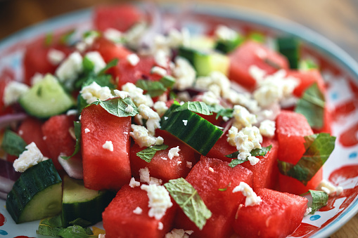 Watermelon Salad with Cucumber, Onion, Feta Cheese and Mint Leaves