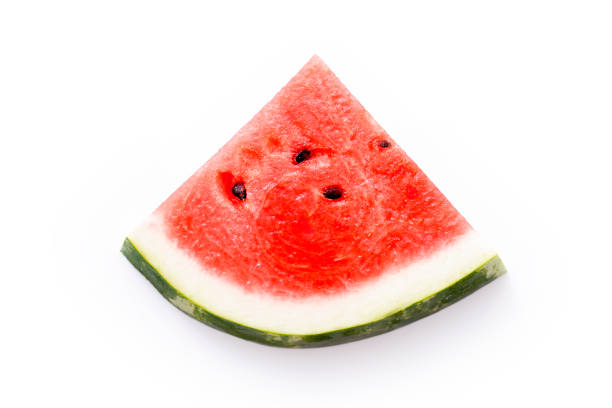 Watermelon slice as triangle isolated on white. stock photo