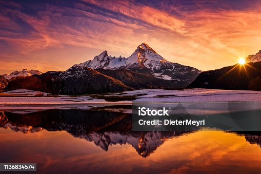 istock Watzmann in Alps, dramatic reflection at sunset - National Park Berchtesgaden 1136834574