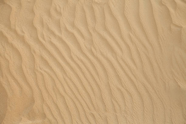 Waves of sand stock photo