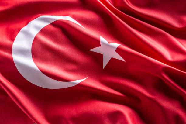 Waving flag of Turkey. National symbol of country and state. stock photo