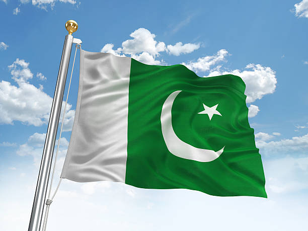 Waving Pakistan flag Waving Pakistani flag against cloudy sky. High resolution 3D render. pakistan flag stock pictures, royalty-free photos & images