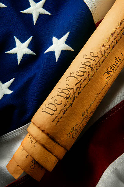 We the People 9 Copy of the United States Constitution on American flag.To see more of my patriotic images click on the link below: 1776 american flag stock pictures, royalty-free photos & images